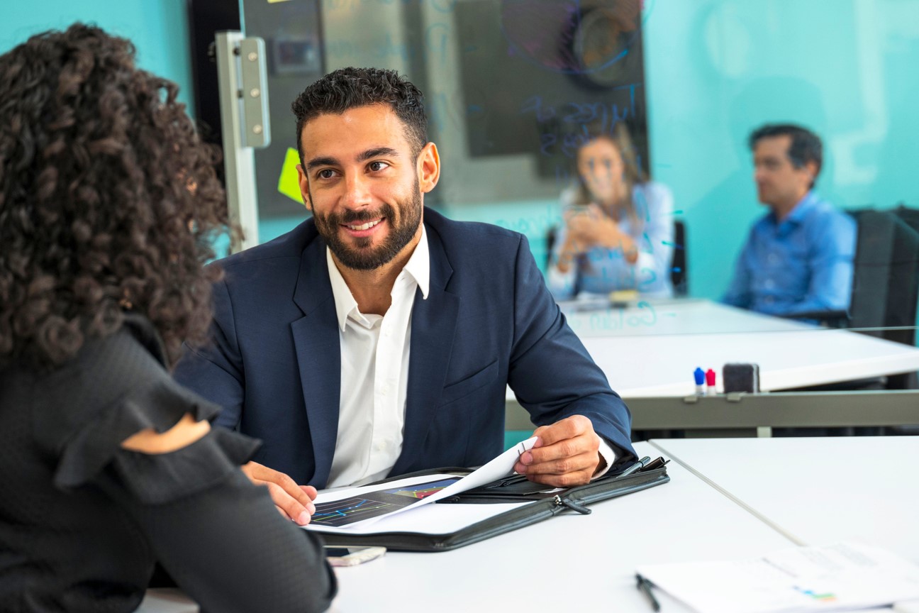 Encore Corporate Travel - Agent Advising potential passenger on options - 2022.